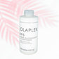 Olaplex conditioner: 9.7 oz Bond Hair Bar 